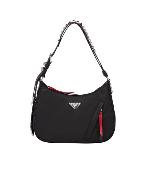 prada black nylon hobo bag with leather and studs|prada nylon bag second hand.